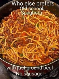 a skillet filled with spaghetti and sauce on top of a stove next to the words, who else prefers old school spaghetti? with just ground beef no sausage