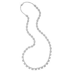 Diamond white gold long necklace Round- and baguette-cut diamonds of approximately 32 carats, 18 karat white gold; chain marked 18K Size: width 0.31 inch, length 31 inches Total weight: 69.3 grams Platinum Diamond Cut Necklace For Evening, Evening Platinum Necklace With Diamond Cut, Evening Platinum Diamond Cut Necklace, Luxury Evening Necklaces With Baguette Diamonds, Luxury Baguette Diamond Necklaces For Evening, Luxury Evening Necklace With Baguette Diamonds, Formal Baguette Diamond Necklaces, Platinum Necklace With Baguette Cut Diamond Accents, Formal White Gold Necklace With Baguette Diamonds