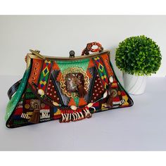 Mary Frances Handbag Good Condition No Rips Has Some Stains On The Back Please Use Pictures As They Are The Best Descriptors. Measurements: H 6 X W 12 X D 4 Came From Smoke Free Home Happy To Answer Any Questions Same Or Next Day Shipping Offer's Are Welcome Thank You Embellished Multicolor Shoulder Bag, Embellished Multicolor Bags As Fashion Accessory, Embellished Green Rectangular Shoulder Bag, Green Embellished Rectangular Shoulder Bag, Bohemian Handheld Embellished Bag, Embellished Multicolor Pouch Shoulder Bag, Traditional Embellished Green Bag, Traditional Green Embellished Bag, Traditional Green Embellished Bags