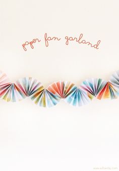 colorful paper fan garland with the words pop for england written in red on white background