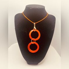 Beautiful Necklace For Women Material: Solid Plastic Color: Orange Design: Ring Measure: Os Nickel Free Brand New Adjustable Round Orange Jewelry, Adjustable Orange Metal Jewelry, Minimalist Adjustable Orange Jewelry, Orange Round Pendant For Jewelry Making, Orange Circular Jewelry As A Gift, Modern Orange Metal Jewelry, Adjustable Orange Nickel-free Necklace, Orange Circular Jewelry Gift, Minimalist Orange Jewelry For Gifts