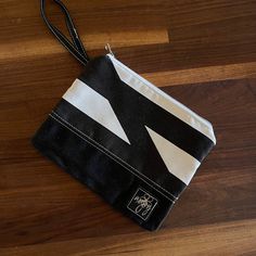 "Striped Woven with Black Waxed Canvas, Black & White Horizontal Stripes with a Diagonal thrown in occasionally! Super Classy! Fully lined with 100% Cotton Duck Canvas.  Can be used as a wristlet purse, cosmetic bag, storage/organizer pouch inside a larger bag, possibilities are endless.   Large - 9 1/2\"X7 1/2\", strap is 5\" *measurements are approximate as these are all handmade Spot Clean Only *Pattern by Ithinksew" Electronic Storage, Electronics Storage, Special Gifts For Her, Pouch Organizer, Wristlet Purse, Duck Canvas, Waxed Canvas, Horizontal Stripes, Coin Purses