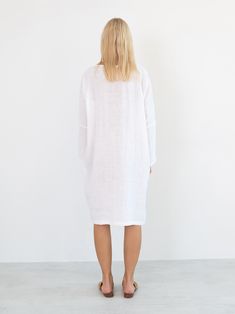 "FRIDA is a long sleeve linen dress with belt. DETAILS - Long sleeves - V neckline - Relaxed fit - Knee length - Self tie belt - Side seam pockets - 100% lightweight European linen fabric - Cut and sewn to order just for you in our studio COLOR - White, you can also choose other colors above - Fabric samples are available here https://www.etsy.com/listing/586569696/linen-fabric-samples SIZING & FIT - Relaxed fit - Length is approximately 38.5 inches / 98 cm - Bust is approximately 21 inches Belted Linen Dress For Daywear, Oversized Linen V-neck Dress, White Long Sleeve Linen Dress For Spring, White Long Sleeve Summer Dress For Daywear, White Long Sleeve Dress For Summer Daywear, Linen V-neck Tunic For Daywear, Spring Linen Tunic For Loungewear, White Linen Long Sleeve Dress, Oversized Linen Long Sleeve Tunic