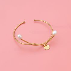 Style: Female Material: Titanium Steel, Imitation Pearl Pearl Type: Uncultured Pearl Color: White Pearl Shape: Irregular Bangle Color: Gold Bangle Perimeter: 16cm Minimalist Alloy Bangle Bracelets, Minimalist Alloy Bangle Bracelet, Minimalist Pearl Bracelet For Gift, Minimalist Metal Pearl Bracelet For Gift, Minimalist Metal Pearl Bracelet As Gift, Adjustable Metal Pearl Bracelet, Adjustable Nickel-free Metal Pearl Bracelet, Adjustable Modern Pearl Bracelet For Gift, Trendy Adjustable Metal Pearl Bracelet