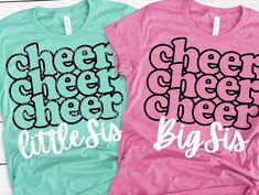 two t - shirts with the words cheer cheer and little sis printed on them, sitting next to each other