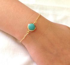 Natural Turquoise Bracelet, Gold Plated Bracelet, Blue Jewelry, Fashion Jewelry, Modern, Stylish, Natural Stone,Beach Accessory, Summer Jewelry Natural Turquoise bead surrounded with gold material which is nonturnish.. Perfect to wear it with jeans in casual times.I like this piece. It can be worn as an ankle bracelet,it is your choise. It is 7 inches long (adjustable upon request) I appreciate your taking the time to look at my items. Thank you. Happy Shopping! Turquoise Bracelet Gold, Stone Beach, Multi Chain Bracelet, Bracelets Etsy, Gold Plated Bracelet, Casual Jewelry, Bohemian Bracelets, Bracelet Blue, Jewellery Inspiration