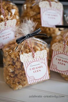 several bags of popcorn sitting on top of a table