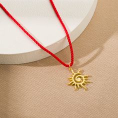 Minimalist Spiral Sun Charm Red String Necklace-925 Silver Sun Pendant Necklace With Red Cord-Dainty Summer Necklace Jewelry Gift For Her 🌞 Add a touch of warmth and positivity to your style with our Minimalist Spiral Sun Charm Red String Necklace. ✨ This dainty necklace features a 925 Silver sun pendant, symbolizing vitality and energy, elegantly paired with a vibrant red cord. Perfect for those who appreciate a blend of simplicity and meaningful design, this necklace is ideal for summer or as Red Spiral Jewelry As Gift, Red Spiral Jewelry For Gifts, Spiral Shaped Red Jewelry For Gifts, Adjustable Red Spiral Jewelry, Adjustable Red Pendant Charm Necklace, Red Adjustable Pendant Charm Necklace, Spiral Sun, String Necklace, Meaningful Design