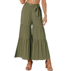 Flowy wide-leg pants with an elastic waist cinched by an attached tie belt making these pants more distinctive and attention-grabbing. The relaxed fit and butterfly hem make them a great choice for spring and summer closets. The flared-leg trousers have oversized ruffling and an elastic waist for easy movement. In these sultry yet comfortable wide-leg pants, catch the breeze and plenty of double takes. Belt Making, Flowy Wide Leg Pants, Bohemian Pants, Wide Leg Lounge Pants, Stretch Dress Pants, Wide Leg Palazzo Pants, Flowy Pants, Ladies Of London, Hem Style