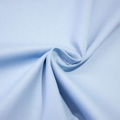 a close up shot of the light blue fabric