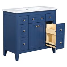 a blue bathroom vanity with drawers and a white counter top on an isolated white background