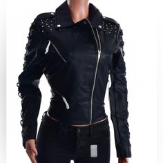 Women’s Members Only Faux Leather Biker Jacket-Black This Women’s Studded Vegan Leather Jacket Features A Signature Moto Jacket Fit With Studs On The Shoulder And Stitching Detail Of Braid Lacing Up The Sleeves. Fold Over Collar Asymmetrical Zip Closure 20″ Length Front Zip Closure Notched Collar Long Sleeves Chest And Side Zip Pockets Lined 100% Polyurethane Spot Clean Imported True To Size Black Leather Jacket With Rivets, Punk Faux Leather Biker Jacket With Zipper, Fitted Black Leather Jacket With Rivets, Casual Leather Jacket With Rivets For Winter, Casual Winter Leather Jacket With Rivets, Black Faux Leather Biker Jacket With Long Sleeves, Trendy Fitted Black Biker Jacket, Trendy Long Sleeve Leather Jacket With Rivets, Punk Style Leather Jacket For Winter Nights