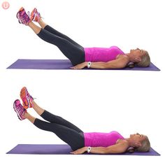 a woman doing a plank exercise on a purple mat