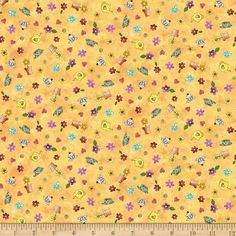 a yellow background with small flowers and hearts on it, as well as a ruler