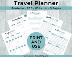 the printable travel planner is shown on top of a wooden table