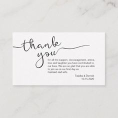 a white thank card with the words, thank you