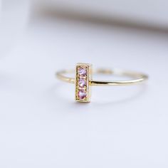 Pink Sapphire Ring, Vertical Bar Ring, Gold Bar Ring, Gold Bar Ring, Modern Gold Ring, Modern Sapphire Ring, Simple Gold Ring, Simple Gold Ring, Pink Gold Ring, Ring for Women, A 14K gold ring with three pink sapphires, brilliant cut, on a vertical bar. A modern minimalist geometric ring. A simple and delicate ring for women, ideal for stacking. The best gift for her. 100% handcrafted with love! D E T A I L S ● Metal: 14K solid yellow gold, 14K white gold ● Gemstones: Pink Sapphires ● Weight: 0. Modern 14k Gold Pink Jewelry, Minimalist Pink Open Ring Jewelry, Minimalist Pink Stackable Rings For Everyday, Minimalist Pink Rings For Everyday Wear, Minimalist Pink Rings For Everyday, Minimalist Everyday Pink Rings, Minimalist Pink Gemstone Stackable Rings, Modern Sapphire Ring, Sapphire Ring Simple