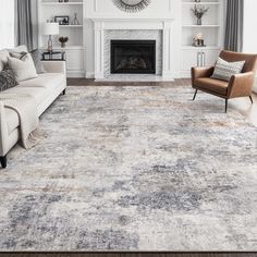 a living room with white furniture and a large rug in front of the fire place