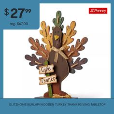 a wooden turkey thanksgiving decoration with the words give thanks written on it's back