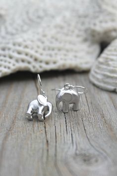 Adorable Pair of lucky elephant earrings on 925 sterling silver French ear wires. Perfect for a little girl or anyone whos looking for extra good Silver Playful Earrings, Playful Silver Earrings, Cute Sterling Silver Earrings With Ear Wire, Cute Sterling Silver Dangle Earrings, Playful Silver Drop Earrings, Playful Handmade Silver Jewelry, Playful Sterling Silver Jewelry, Cute Sterling Silver Drop Earrings, Playful Sterling Silver Hypoallergenic Jewelry