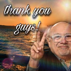 an older man is giving the peace sign in front of water and sunset with words that say thank you guys