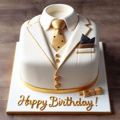 a birthday cake with a suit and tie on it