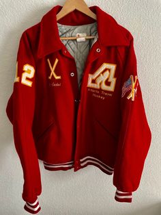 Rare NHL Atlanta Flames Letterman Jacket Atlanta Flames Jacket Retro Atlanta Flames Jacket Atlanta Flames Varsity Jacket NHL Jacket Sz XL ⏱️ SHIPPING & PRODUCTION TIME ⏱️ ∘ Please allow 1-3 business days for processing time. ∘ Shipping time is 3-5 business days. ✨ CARE INSTRUCTIONS ✨ ∘ Inside out, wash with delicate cycle ∘ Hang Dry ∘ Do not use bleach ∘ Do not iron directly onto the design ∘ Do not dry clean ↩️ RETURNS ↩️ We do not accept returns or exchanges. If you have any concerns or questions, please send us an Etsy message 💌 and we'll be happy to help! SHOP: https://www.etsy.com/shop/oatsunknown/ If you are interested in purchasing anything else in the photo, please reach out. Thank you, O.A.T.S. 🌎 Retro Track Jacket For College In Winter, Varsity Sport Coat With Pockets For Fall, Retro Track Jacket For Winter College Wear, Hooded Sport Coat For College In Fall, Long Sleeve Windbreaker For College In Winter, Fall College Sport Coat With Pockets, College Fall Sport Coat With Pockets, Retro Winter Track Jacket For College, Long Sleeve Winter Windbreaker For College