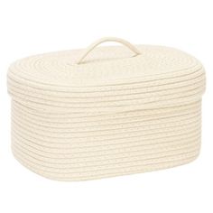 a white rope covered box on a white background