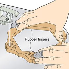 a person is working on an object with their fingers