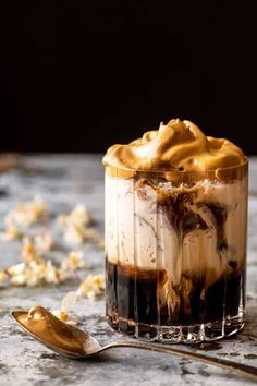 an ice cream sundae with caramel and whipped cream