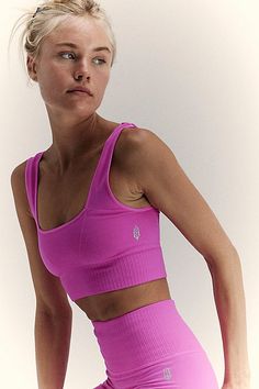 An ultra-flattering sports bra that transitions to brunch, Bikram and beyond with a square neck and ribbed details to enhance the shape of your body. * Ribbed bottom band stays in place * Low square back * Wide straps for extra support * Equipped with SPF 30 UV protection | Good Karma Square-Neck Bra by FP Movement at Free People, Living Magenta, M/L Sports Ribbed Scoop Neck Sports Bra, Sporty Ribbed Scoop Neck Sports Bra, Ribbed Scoop Neck Sports Bra In Athleisure Style, Athleisure Ribbed Scoop Neck Sports Bra, Compressive Ribbed Sports Bra For Athleisure, Pink Ribbed Sporty Activewear, Seamless Scoop Neck Sports Bra, Good Karma, People Living