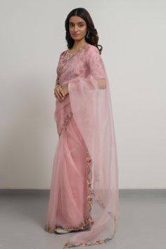 Blush pink silk organza saree with floral and sequins hand embroidered borders. Comes with a blouse.
Components: 2
Pattern: Hand embroidered
Type Of Work: Floral, Sequins
Neckline: Round
Sleeve Type: Half
Fabric: Silk organza
Color: Pink
Other Details: 
Disclaimer : The product will dispose off some color, since it is hand dyed.
Occasion: Wedding - Aza Fashions Lily Silk, Add Sleeves, Border Saree, Organza Saree, Silk Organza, Pink Saree, Saree With Blouse, Pink Silk, Sarees Online