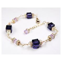 Luscious dark purple Swarovski crystal bracelet is handmade with gorgeous large deep purple Swarovski crystal cubes and small lavender Swarovski crystal cube accents. Bright and clear Swarovski crystal rhinestone crowns add sparkle to this elegant modern bracelet.  A gorgeous bracelet gift for a woman who loves purple hues and sparkly jewelry. Dressy bracelet perfect for weddings: maid of honor, mother of the bride or mother of the groom thank you gifts. Bracelet Details: - Bracelet length is 7 Purple Crystal Beaded Bracelets As Gift, Elegant Purple Bracelets For Wedding, Elegant Purple Wedding Bracelets, Purple Crystal Bracelet As A Gift, Purple Crystal Bracelets For Gift, Purple Crystal Bracelets As Gift, Elegant Faceted Purple Crystal Bracelet, Elegant Purple Faceted Crystal Bracelet, Purple Beaded Bracelets For Wedding