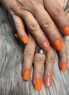 Revitalize your nails with our vibrant orange hue and a touch of silver sparkles during your nail fill appointment! Perfect for keeping your nails fresh and stylish.🧡✨ Nails Fresh, Orange Hues, Orange, Silver