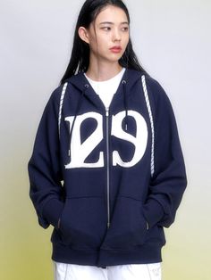 This product is a sporty zip-up hoodie that features a bold 129 logo patch on the front, making it a standout item for casual wear. It's crafted from a soft and durable fabric that offers both warmth and comfort. The hoodie also includes a drawstring hood and spacious front pockets for added functionality. - The large 129 logo patch on the front of the hoodie gives it a distinctive, eye-catching look.- Made from high-quality fabric, the hoodie is designed to provide warmth and lasting comfort.- Features a drawstring hood that allows for adjustable coverage depending on weather conditions.- Equipped with spacious front pockets, perfect for keeping hands warm or storing essentials. Sporty Fleece Hooded Jacket For Streetwear, Sporty Hooded Jacket With Letter Print For Streetwear, Athleisure Hooded Jacket With Zipper For Streetwear, Zipper Closure Sweatshirt For Streetwear, Athleisure Hoodie With Zipper Closure For Streetwear, Sportswear Sweatshirt With Zipper Closure, Sportswear Sweatshirt With Zipper For Streetwear, Athleisure Zipper Hoodie For Streetwear, Streetwear Sportswear Hoodie With Zipper Closure