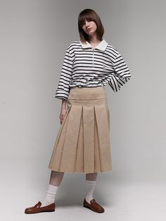 Editor's NotesThe AEER's cotton pleats skirt is shaped to pleats design in A-line with a low-cut hemline and midi-length, made from high-density cotton blending fabric with a twill structure. It has a belt from the same fabric as the body fabric and a side zipper, and it is lightweight and sturdy, so it is good to wear in spring and early summer. - Pleats design & midi length- A-line - Low-cut hemline - High-density cotton blending fabric with a twill structure- Belt from the same fabric as the body fabricMeasurements(in.)Size: Size (S/M/L)- Waist: 13.38in. / 14.37in. / 15.15in.- Hip: 18.11in. / 19.09in. / 20.07in.- Total Length: 27.55in. / 27.95in. / 27.95in. *Model info: Height 5' 7,  Bust 31in., Waist 24in., Hips 34in. / Wearing a size S  &nbs Classic Cotton Pleated Waist Skirt, Cotton Accordion Pleated Skirt, Casual Beige Pleated Skirt With Accordion Pleats, Beige Cotton Midi Length Skirt, Spring Cotton Skirt With Accordion Pleats, Beige Midi Length Cotton Skirt, Classic Cotton Pleated Skirt With Accordion Pleats, Cotton Pleated Skirt For Workwear In Fall, Classic Cotton Pleated Lined Skirt