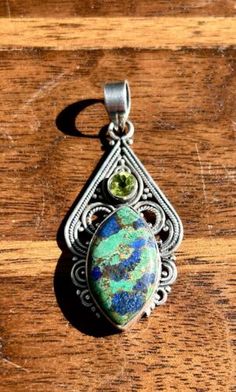 Sterling Silver Azurite Pendant Peridot Handmade Artisan Jewelry Vintage 925 | eBay Artisan Sapphire Gemstone Jewelry, Artisan Green Multi-stone Jewelry, Artisan Lapis Lazuli Jewelry With Gemstone, Artisan Lapis Lazuli Gemstone Jewelry, Fusion Style Peridot Gemstone Jewelry, Handmade Green Fusion Gemstones, Green Peridot Bohemian Jewelry, Fusion Peridot Jewelry Gift, Fusion Style Peridot Jewelry Gift