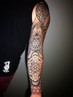 a man with a tattoo on his arm