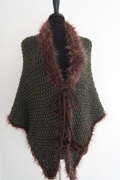 "Cozy up in this earth color shawl while watching your favorite TV series or reading Diana Gabaldon's book. I made this shawl from soft wool/acrylic yarn. It is embellished with faux fur trim and cords that can be tied. AVAILABLE: Size Large US Measurements: Tip to tip: approx.69\" (175cm) Top to bottom: approx.35\" (89cm) See more shawls here - https://www.etsy.com/shop/KnitsomeStudio/items?section_id=25373486 and here - https://www.etsy.com/shop/KnitsomeStudio?section_id=6598836 Don't forget t Cozy Knit Shawl For Winter, Winter Shawl Knitting Pattern, Crochet Knit Shawl For Winter, Fall Shawl Knitting Pattern, Winter Crochet Knit Shawl, Knit Shawl Wrap For Winter, Hand Knitted Brown Poncho For Winter, Winter Knitted Yarn Shawl, Winter Shawl Knitting Pattern One Size