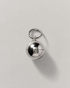 Inspired by moments of joy and surprise. Its elegant spherical design conceals a hidden interior of reflection, Carry it anywhere with its convenient keychain feature. Silver Keychain, Ring Size Guide, Accessories Rings, Ring Bracelet, Keychains, Necklaces Bracelets, Ring Size, Accessory Gift, Gift Card