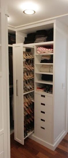 the closet is full of shoes and other things to wear in it's storage area