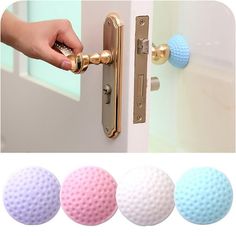 three door knobs with different colored balls on the front and back of each door