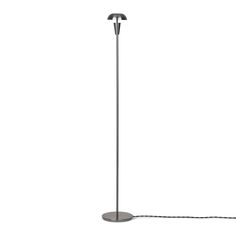 a floor lamp on a white background with a cord attached to the base and an arm