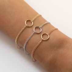 Crafted with a double chain and decorated with a minimal circle at the center. Layered with other bracelet styles and rings for the ultimate fashion-forward look. Colors in: .925 Sterling Silver / Gold Vermeil / Rose Gold Vermeil Hypoallergenic, lead, and nickel free Length: 6.5-7.1in (16.5-18.1cm) Circle Diameter: 0.4in (1cm) Spring clasp closure Handcrafted in NYC #B212 Bridal Bracelets, Eternity Bracelet, Dainty Choker Necklace, Bracelets Silver, Circle Bracelet, Gold Armband, Back Necklace, Dainty Bracelet, Adjustable Jewelry