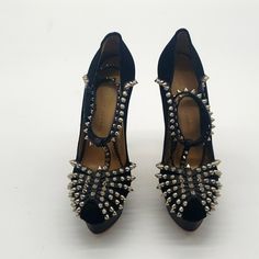 Charlotte Olympia Size 39 Color Black Suede With Silver Spikes 3 1/2 Inch Heels 100% Authentic I Dont Sell Fake Brands All Items Can Be Verified At Store Locations Condition Is New Never Been Worn Designer Spiked High Heels, Black Spiked High Heels, Black Spiked Round Toe Heels, Black Spiked Evening Heels, Chic Black Heels With Spikes, Black Spiked Heels For Evening, Chic Black Spiked Heels, Luxury Spiked Round Toe Heels, Luxury Spiked Heels With Round Toe