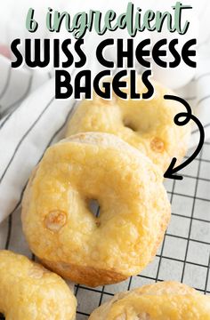 four bagels sitting on top of a cooling rack with the words ingredient swiss cheese bags below them