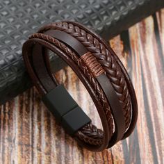 Material: Leather Leather Bracelets With Wrist Strap As Fashion Accessory, Casual Black Leather Bracelet, Brown Leather Bracelet With Wrist Strap, Elegant Brown Leather Bracelet, Leather Bracelet With Black Band, Black Leather Bracelet For Fashion, Casual Brown Leather Bracelet, Adjustable Leather Bracelet As Fashion Accessory, Black Leather Bracelet With Leather Strap