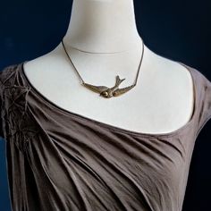 Sparrow In Flight Vintage Style Necklace available in Antiqued Brass o | Ragtrader Vintage Antique Brass Necklace Nickel Free, Antique Brass Nickel-free Necklace, Antique Hand Forged Bronze Necklaces, Bronze Hand Forged Antique Necklace, Antique Silver Brass Necklace Vintage Style, Antique Silver Brass Vintage Necklace, Vintage Bronze Hand-cast Necklaces, Vintage Bronze Hand Cast Necklaces, Antique Copper Necklace With Antique Finish