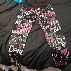 Brand New Pink Sports Bottoms With Graphic Print, Pink Sports Shorts With Graphic Print, Black Stretch Leggings With Graphic Print, Stretch Leggings With Letter Print For Streetwear, Stretch Letter Print Leggings For Streetwear, Black Letter Print Workout Pants, Trendy Stretch Leggings With Letter Print, Scene Clothes, Justice Leggings