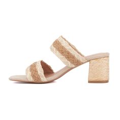 Shift into neutral with the Fala sandal, featuring beige and ivory raffia straps that make it an essential piece for mixing and matching with your wardrobe. The square-toe shape adds a contemporary touch, keeping you on-trend while maintaining timeless style. Perfect for pairing with a variety of outfits, from casual jeans to elegant dresses, the Fala sandal seamlessly blends versatility and sophistication. Elevate your look effortlessly with this chic and neutral sandal, ideal for any occasion. Summer Beige Heels With Heel Strap, Beige Sandals With Woven Sole And Ankle Strap, Cream Block Heel Sandals For Summer, Elegant Beige Heels For Vacation, Beige Ankle Strap Sandals For Vacation, Spring Beige Woven Sandals, Beige Woven Ankle Strap Sandals, Beige Block Heel Sandals For Summer, Beige Summer Heels For Vacation